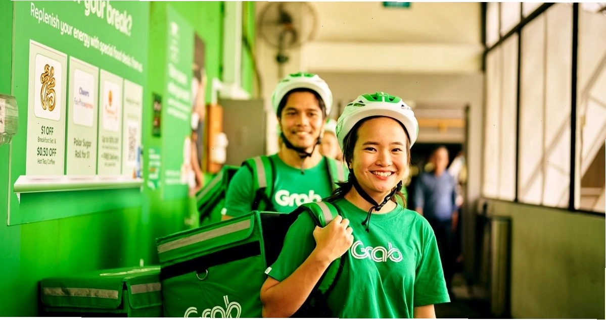 Minh họa người dùng đang sử dụng ứng dụng Grab