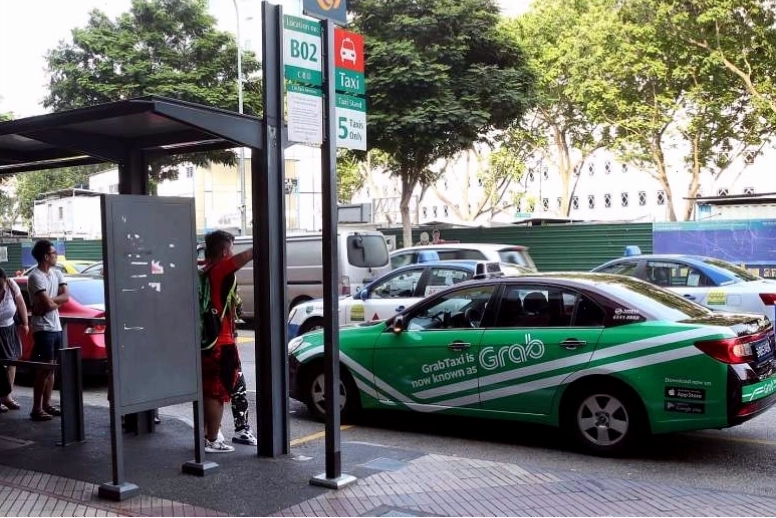Tài xế Grab chuẩn bị đón khách sử dụng tính năng Grab Now