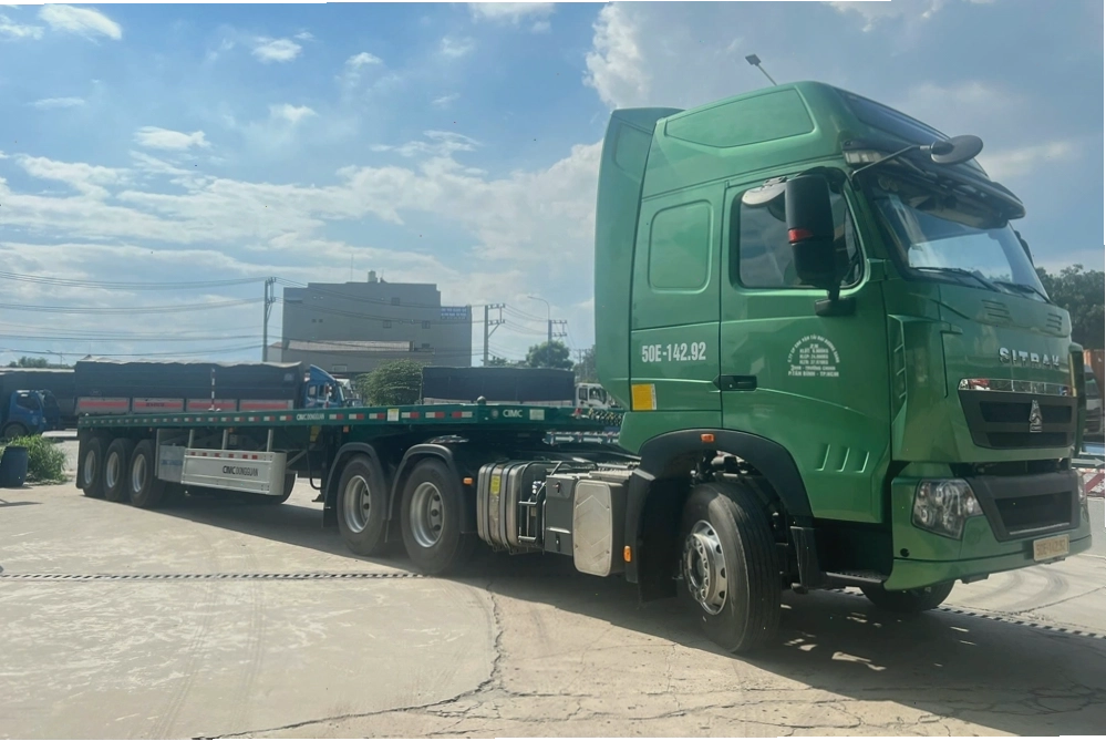 Vận chuyển container bằng xe moóc sàn